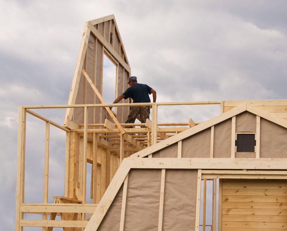 carpenter on the top of the roof